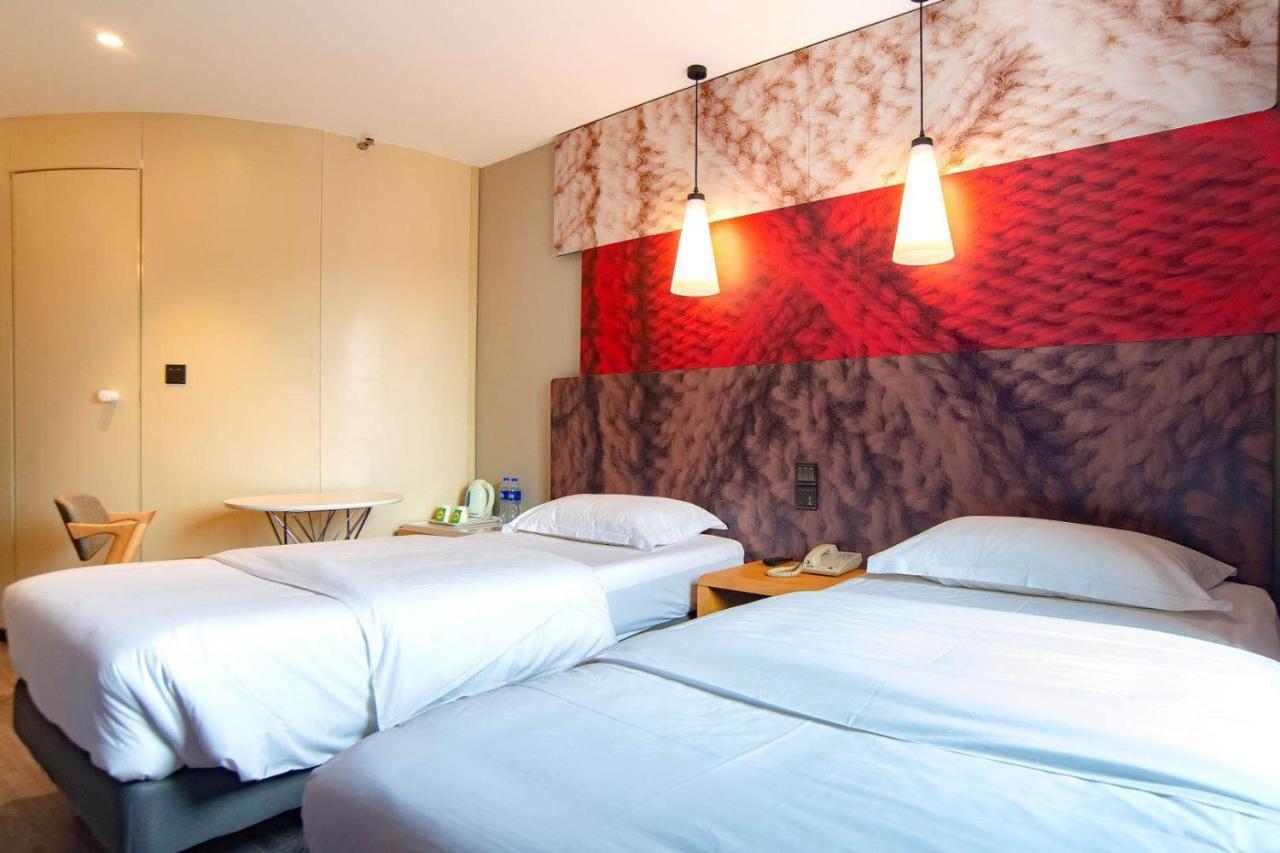 Ibis Wuxi Hi Tech Hotell Exteriör bild